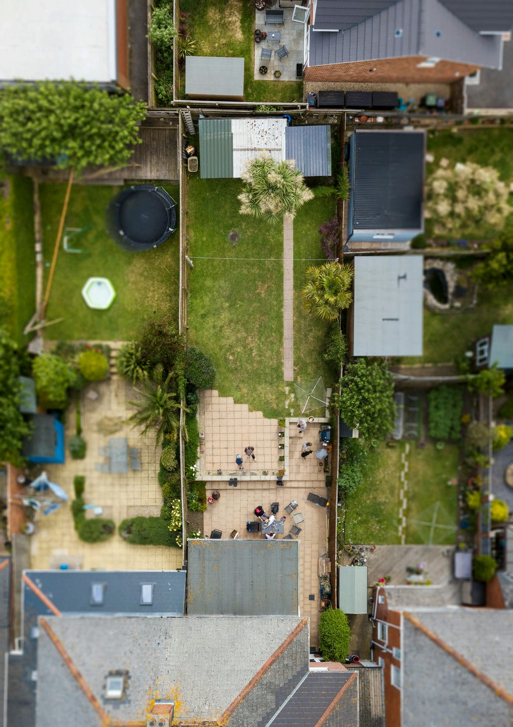 Aerial view of British houses with gardens — mutual exchange lets council tenants swap homes permanently