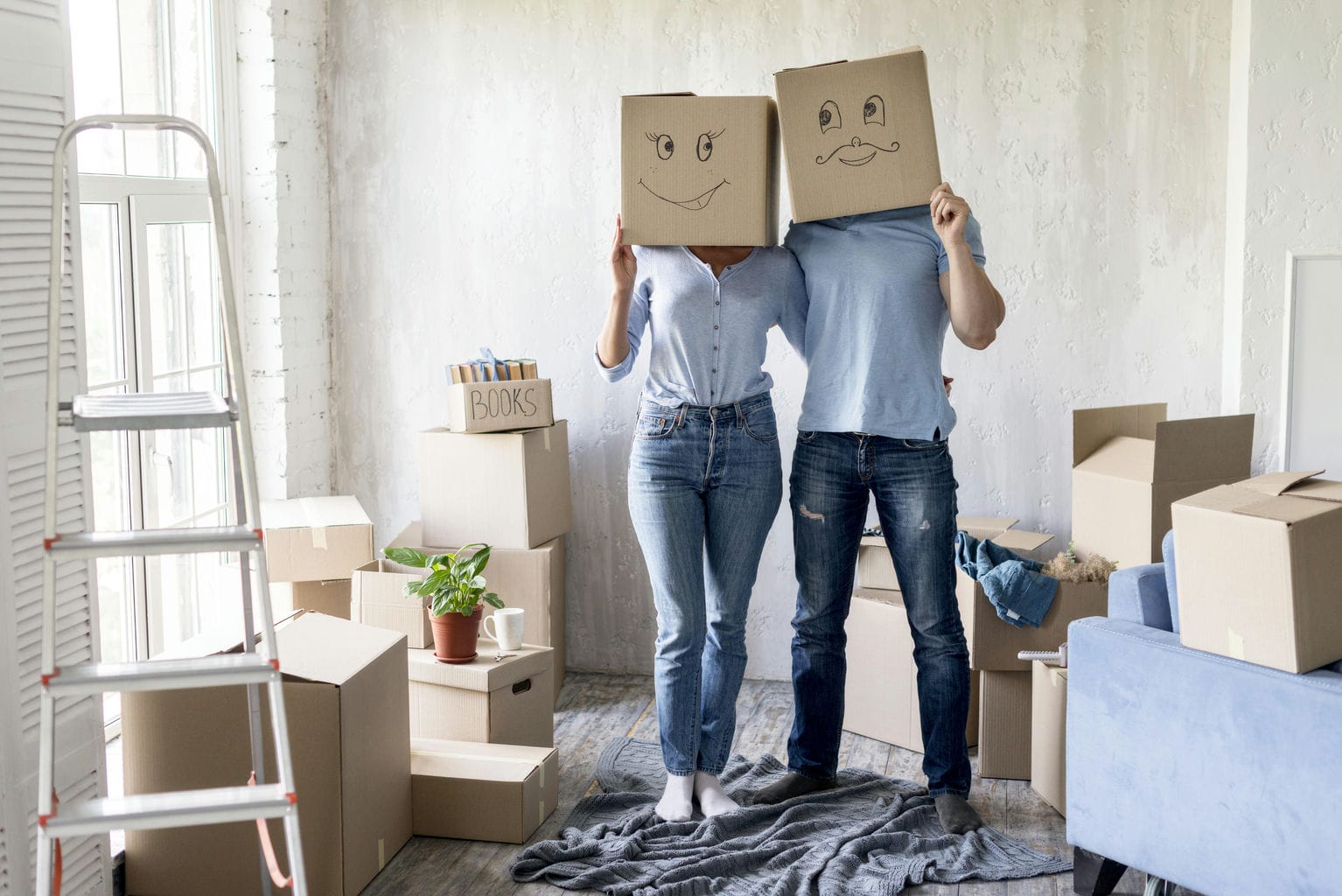 Happy couple on moving day after swapping their council home through MutualExchange